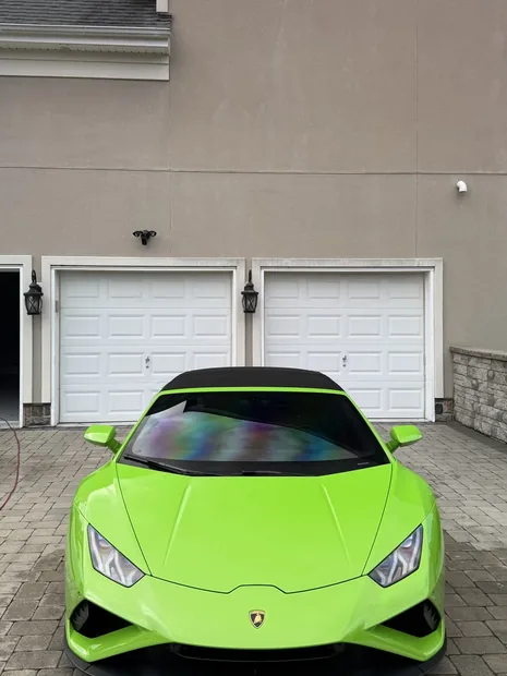 Green Lamborghini Huracan after an exterior detail